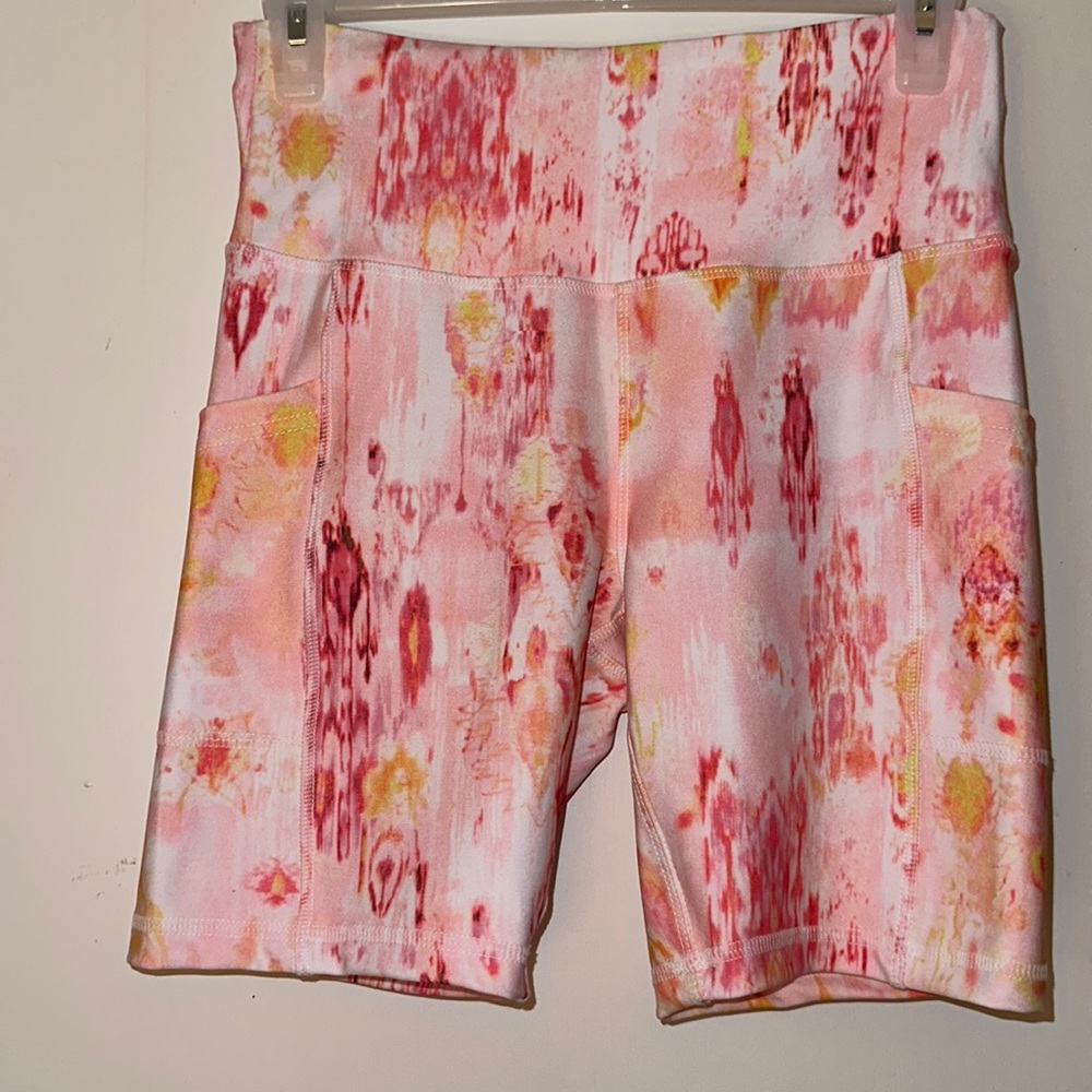 Ebb & Flow Activewear shorts. Multiple shades of Cream, Orange & Reds .